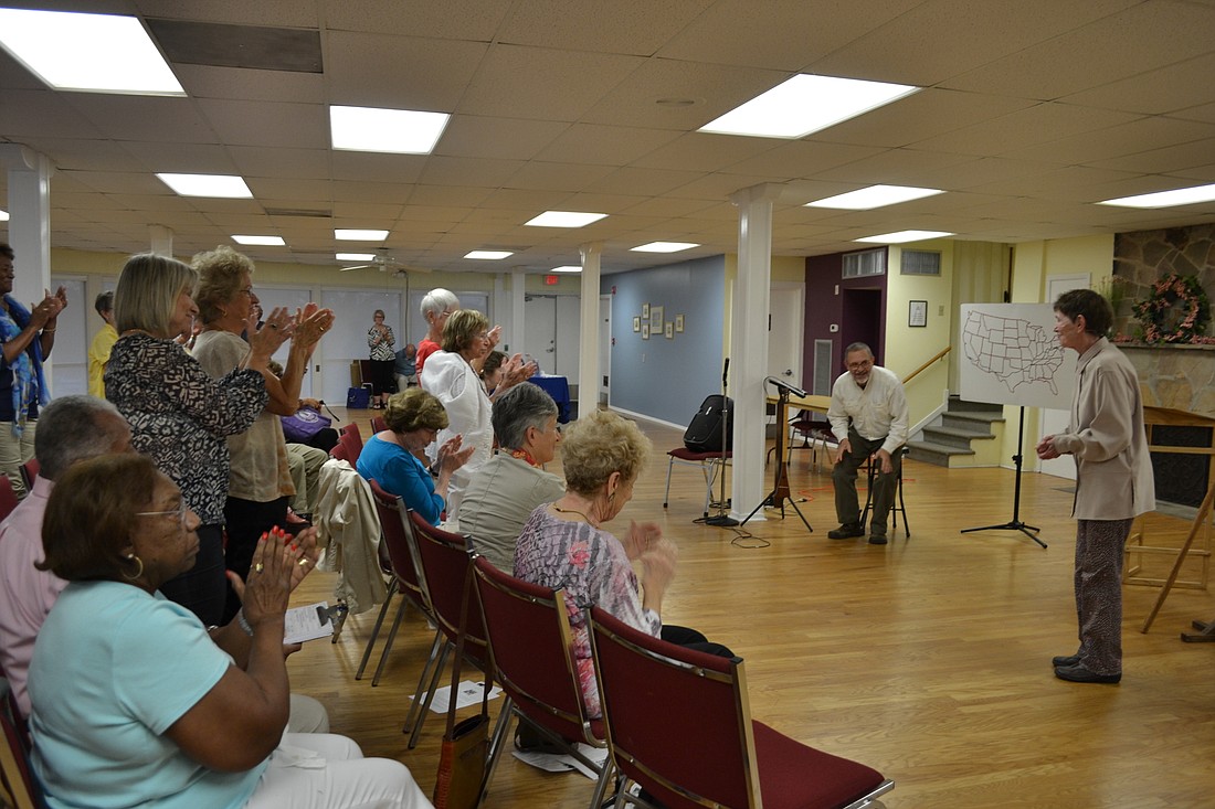 Jef Sebens and Barbara Bates-Smith perform their play "Go,Granny D!" for the Democratic Club of Sarasota.
