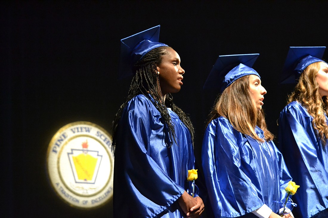 File photo. Graduating Pine View School students perform the national anthem during the graduation ceremony for the class of 2015.