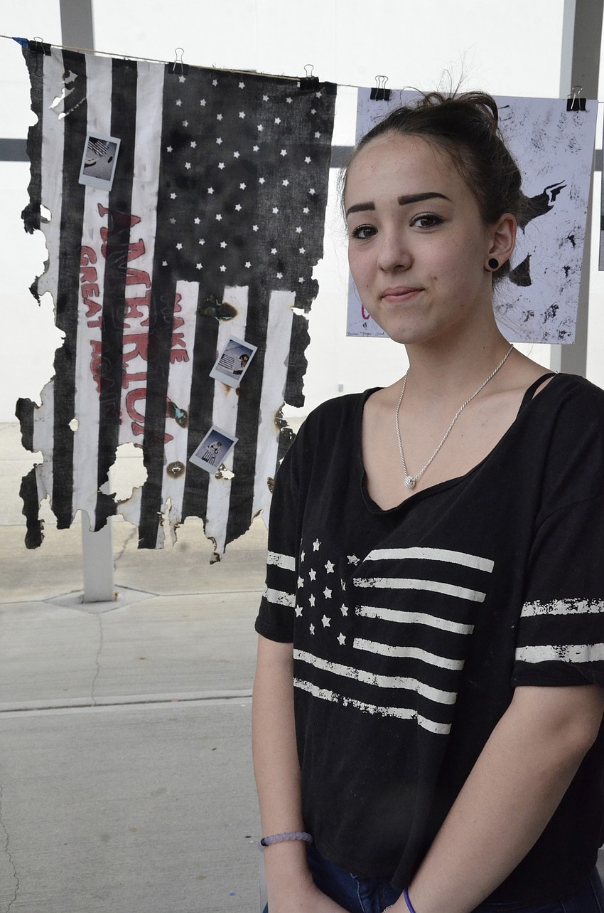 Freshman Alicia Acevedo created what she called an Anti-Trump piece. The piece depicts a tattered flag with Donald Trump's slogan, 