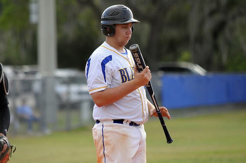 Sarasota Christian senior Teddy Mullet steps into the batter's box.