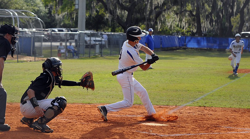 Sarasota Christian sophomore Trey Lantz looks to extend the Blazers lead.