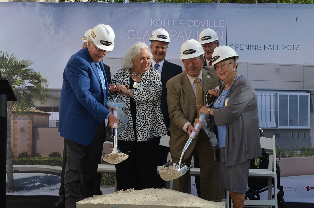 Philip and Nancy Kotler and Warren and Margot Coville break ground on the new center.