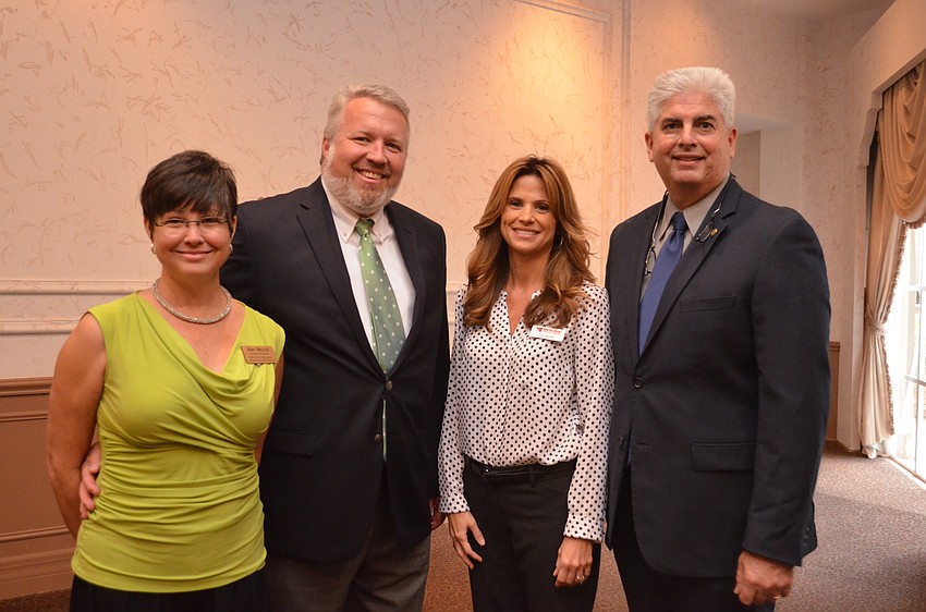 Amy and Jamie Miller, Lori Moran and Rep. Julio Gonzalez