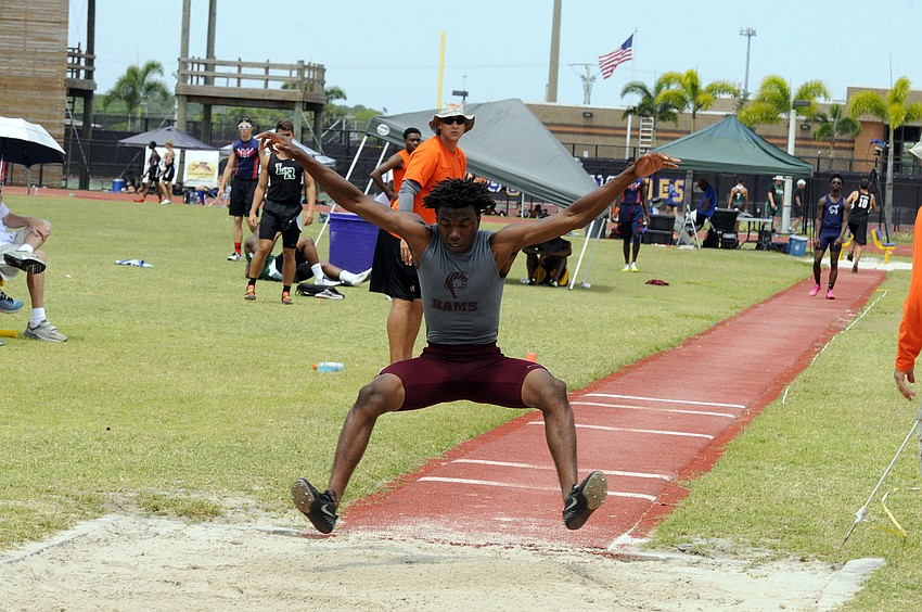 Riverview's Traquan Washington competes in the triple jump at the Class 4A-District 8 meet April 20.
