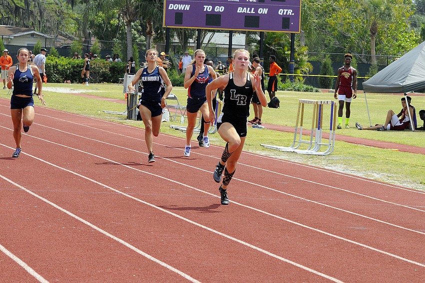 Lakewood Ranch junior Sophia Falco ran away from the field in her preliminary heat of the 100-meter dash.