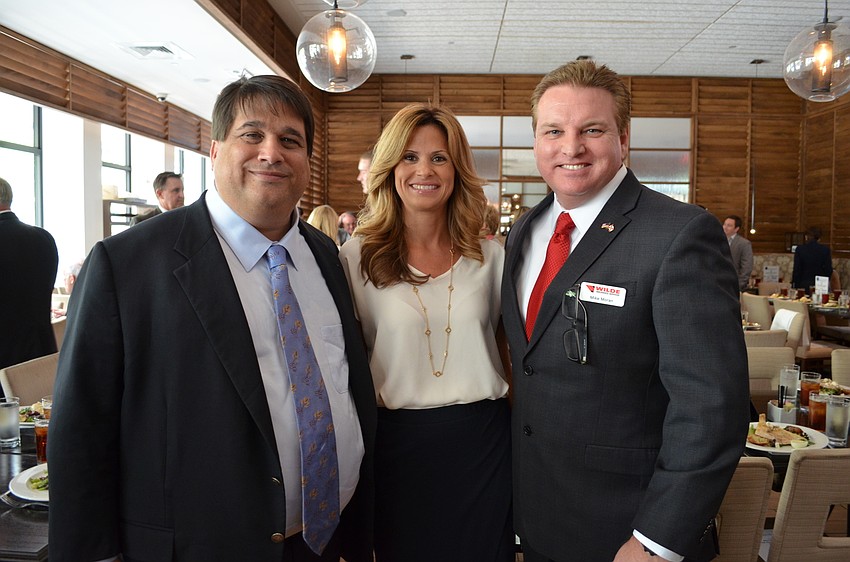 Eric Robinson with Lori and Mike Moran