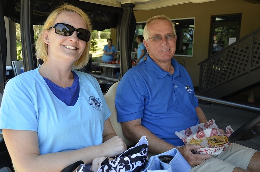 ESE teacher Lisa Wade and Jim Nestle of The River Club
