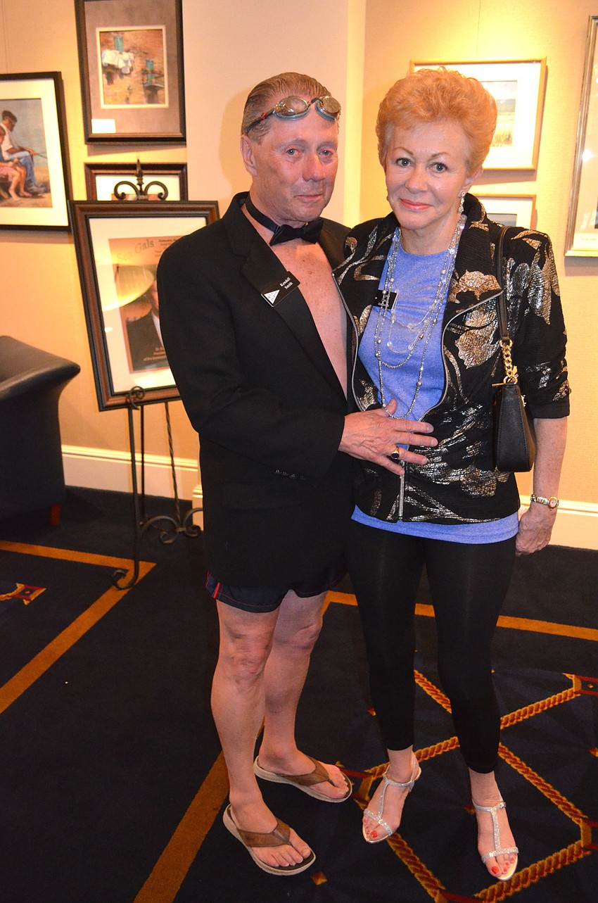 Commodore Lynn Smith, right, with husband, Kendall