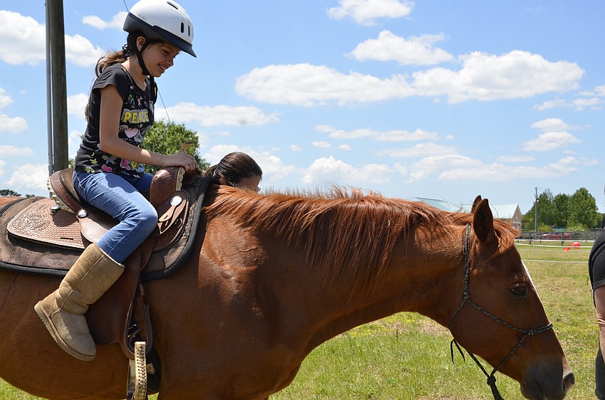 Sierra Trevino of Sarasota gets a lift from Duke,