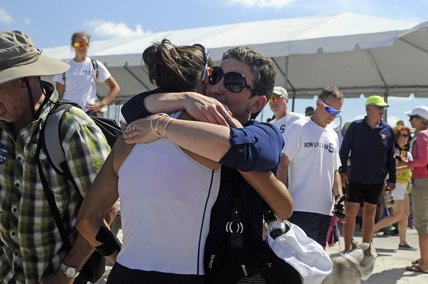 Patricia Lara hugs her daughter, Rosa Kemp, following her final race at the U.S. Olympic Team Trials April 24.