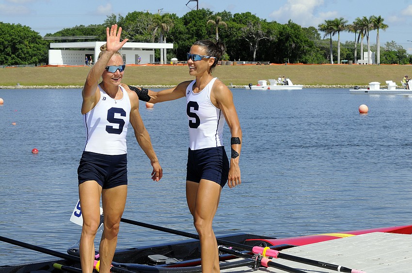 Sarasota Crew's Monica Whitehouse and Rosa Kemp acknowledge the hometown crowd following  their final race at the U.S. Olympic Team Trials April 24.
