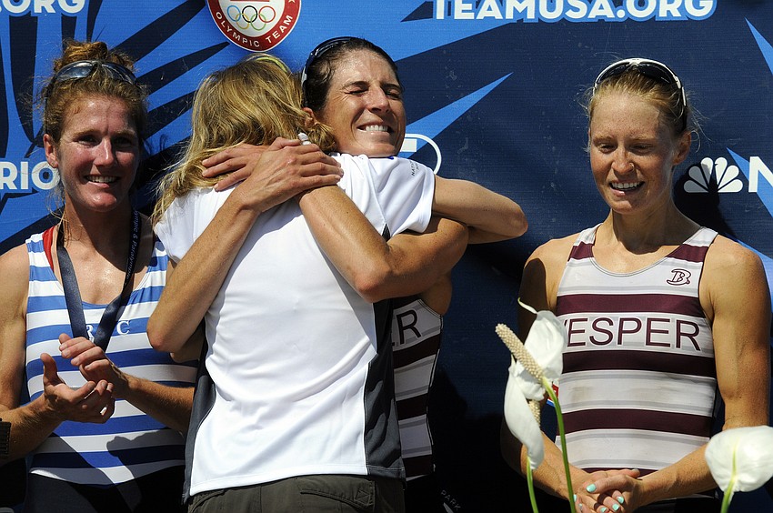 Kate Bertko celebrates after   she and partner Devery Karz, right, punched their ticket to Rio in the women's lightweight 2x.