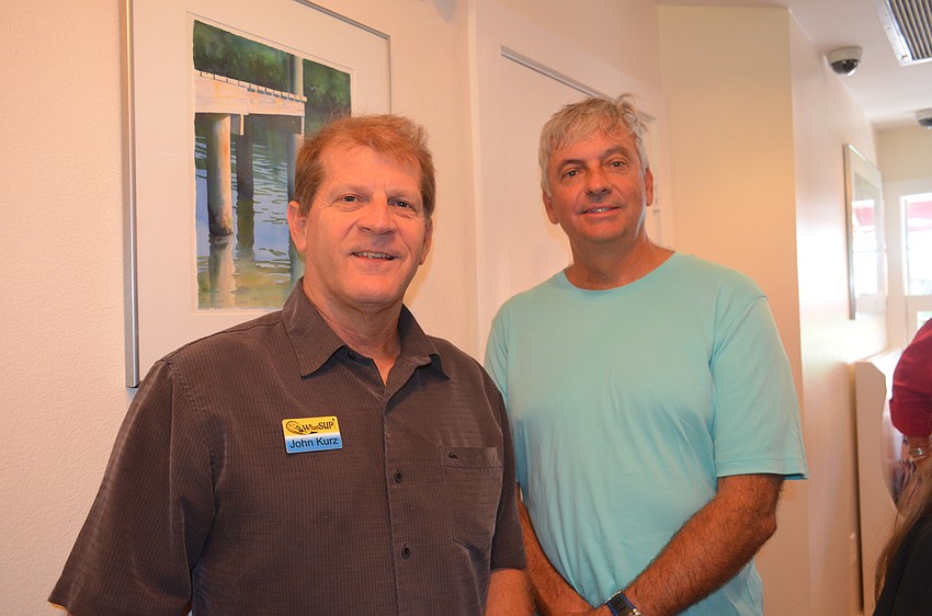 John Kurz,, of WhatSUP, and attorney Ralf Brookes