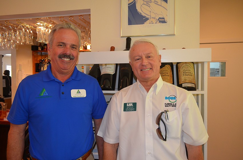 Mike Southwick, of event sponsor AAA Payroll Service, and John Wojtyna, of Aqua Plumbing and Air