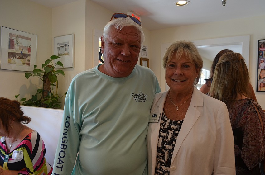 David Miller, of Cannons Marina, and Chamber President Gail Loefgren