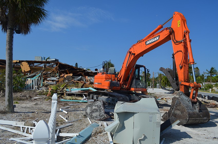 An excavator has been tearing apart the former Moore’s Stone Crab Restaurant on Longboat Key this week.