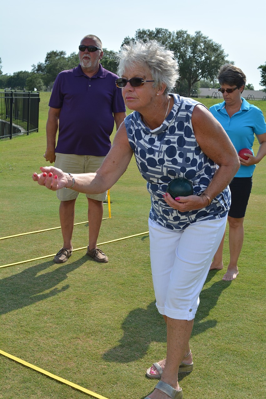 Sue Laker tests her aim.