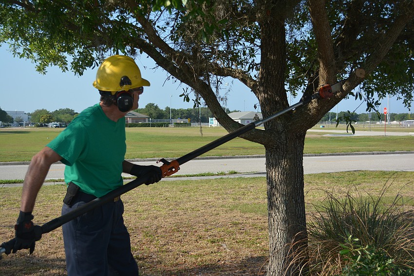 Ken Green cuts off another limp on the Red Cross grounds.