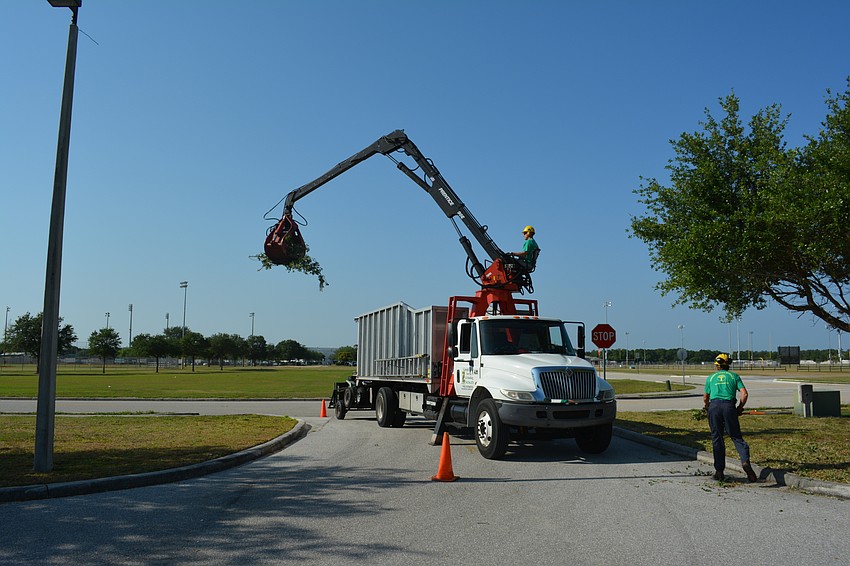 With the right equipment, Ken and Tyson Green made the work at the Red Cross building look easy.