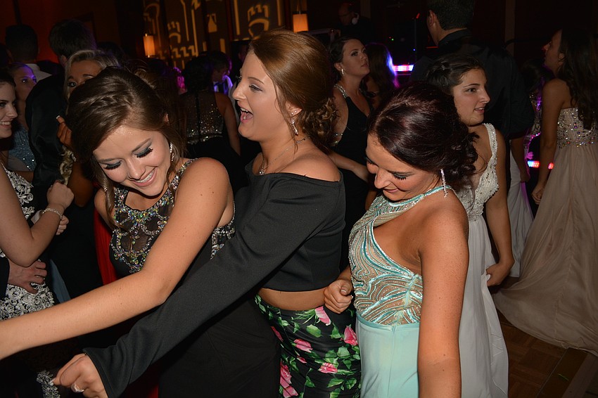 Friends Sarah McKenna, Chanel Duregger and Quinlann Jones dance to 