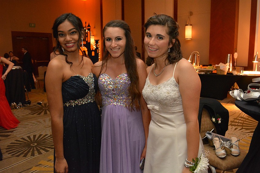Juniors Kirina Lakhwani, Cristina Heupel and Karlie Jarvis attend prom for the first time.