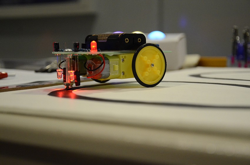 Joseph Long's robot is programmed to follow the black track he had drawn out.