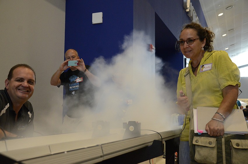 Jody Vangor of Venice races carbon dioxide-powered cars with her son, Van. Brian Kendzior of Southeast High School leads the F1 in Schools team.