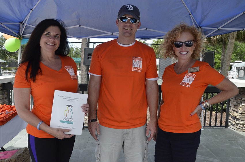 Community Council volunteers Lori Campbell, Andy Telatovich and Anne Heller