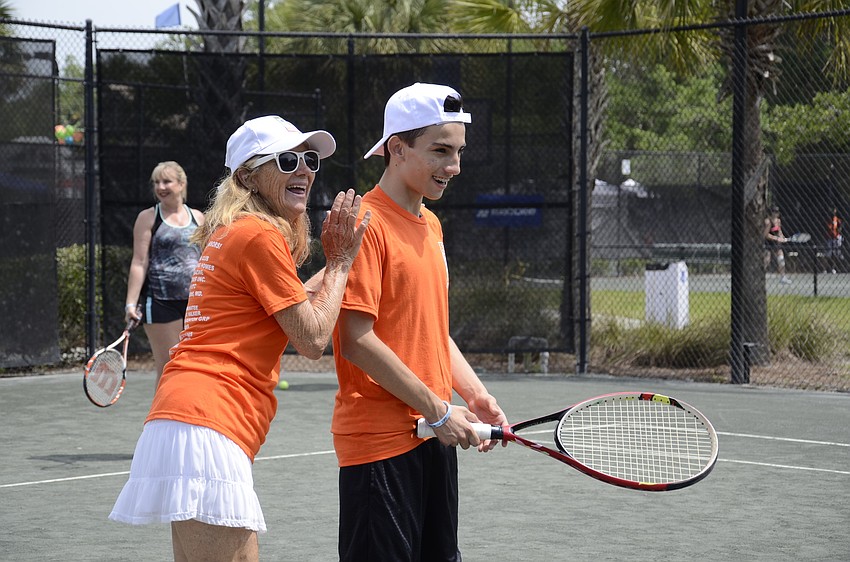 Brenda Murtz of Nokomis jokes with Lucas Naranjo of Lakewood Ranch.