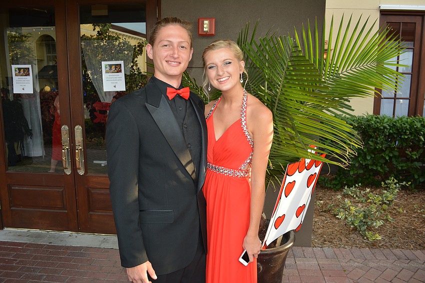 Jake Brown, a graduate, and Sabre Hensley, a junior, are all smiles before the event.