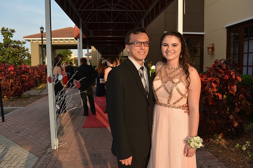 Senior Jesse Charbonneau and sophomore Jamie Grella get ready to begin their big night.