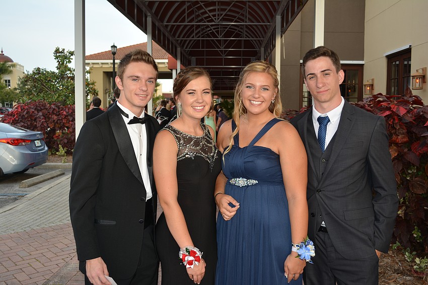 Graduate Anthony Marino, junior Danielle Thimons, sophomore Sydni Polinsky and junior Dylan Culbertson get ready to rock the Polo Grill.