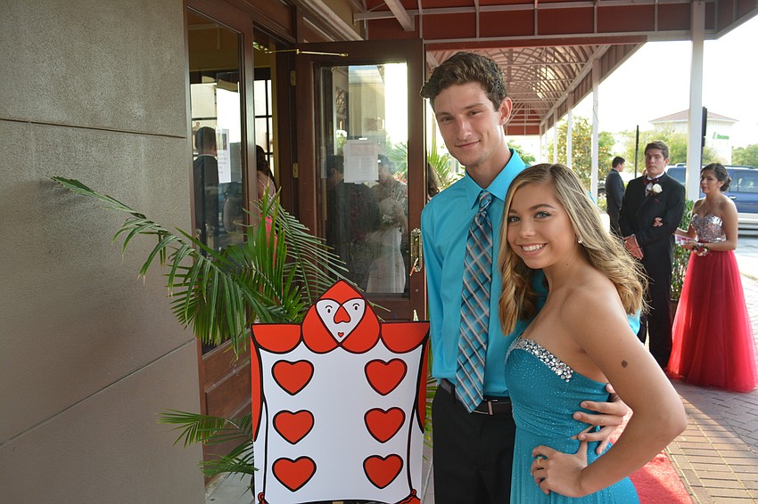 Seniors Hunter Thomas and Kiana Vallor sparkle in blue.