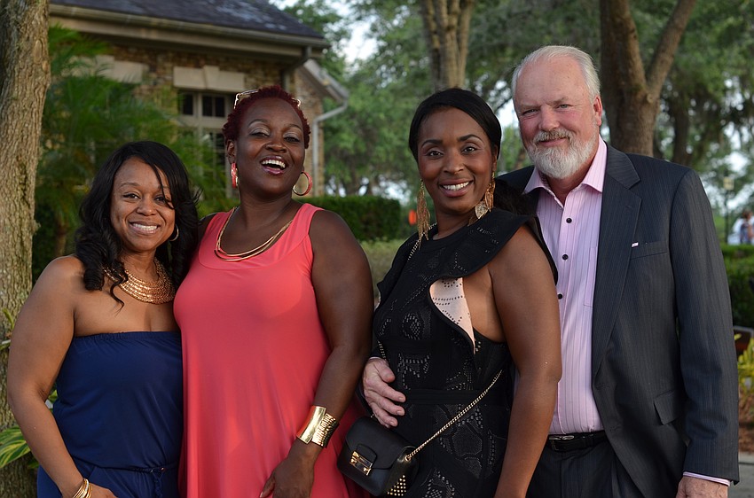 Lakeylia Pyles and Theresa Lemus with Tomeika and Robert Koski