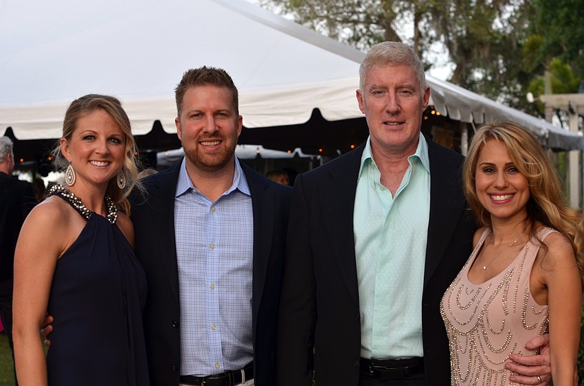 Kara Ostedt and Aaron Thompson with Dave and Leyla Smith