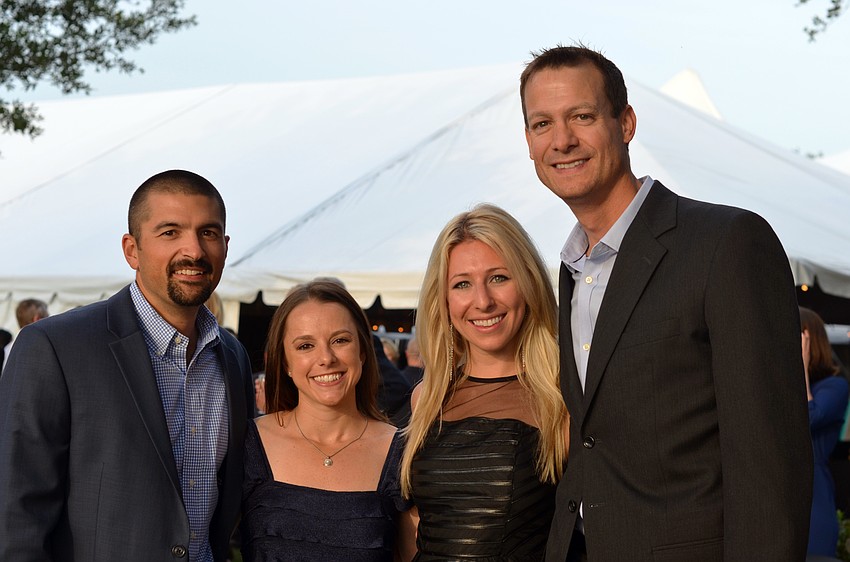 Corey and Ashley Reaves with Anna and Dale Foster