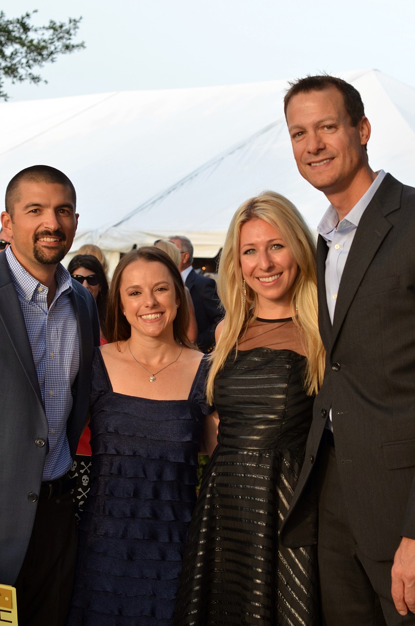 Corey and Ashley Reaves with Anna and Dale Foster