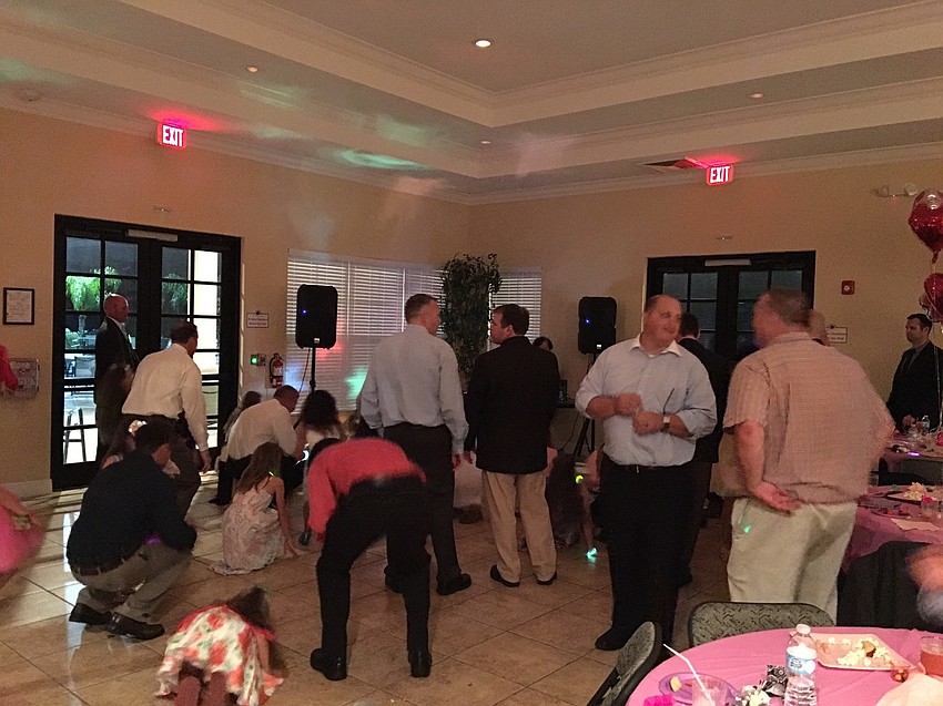 Dads and daughters got their groove on while dancing to DJ Kevvy Kev Mendal. Photo courtesy of Lindsey Wilson.