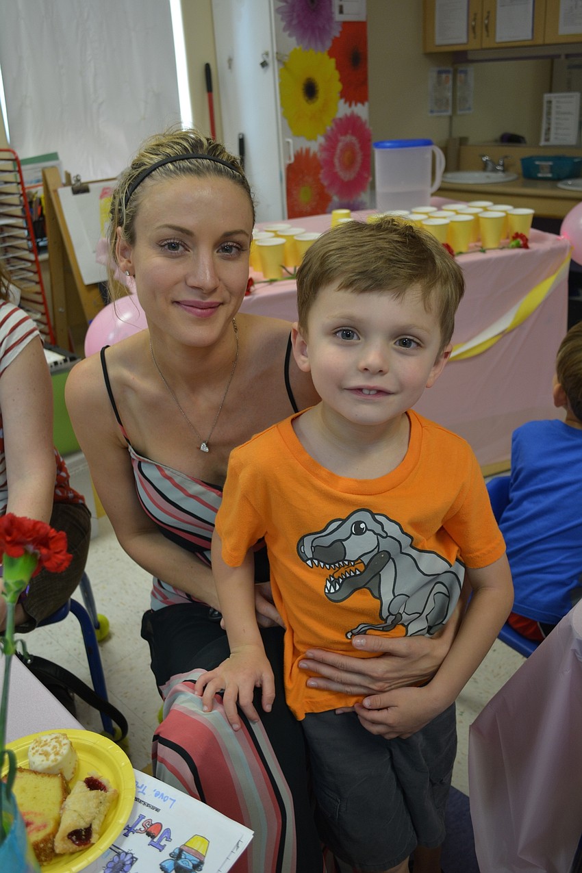 Toni and Trase Silverwood have coffee cake.
