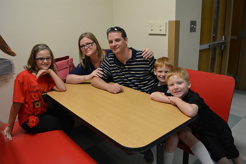 Alexis, Samantha, Daniel, Austyn and Aidan Suter enjoy time together.