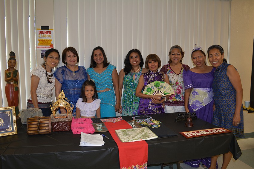Members of the Lakewood Ranch Asian Women's Club bring Asian artifacts and items for students to see.