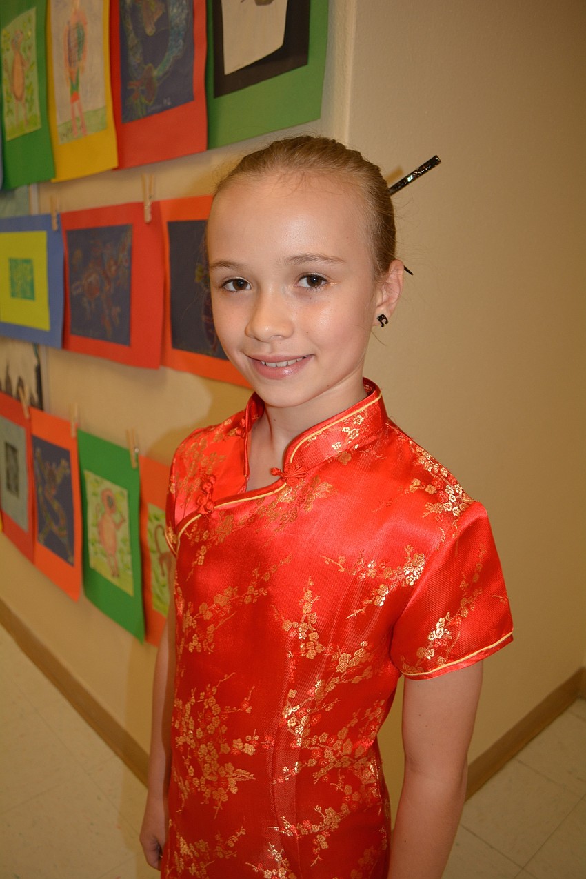 Lauren Costello, 10, sings in the chorus and has a narrator role in the musical performance.