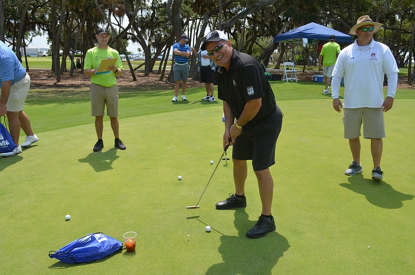 David Oriente participates in the putt-putt tournament.