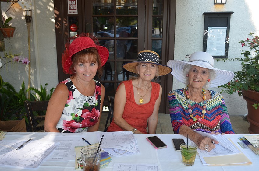 InStride volunteers Rhonda Diggins and Constanza Bryant with event coordinator Janet Hunter