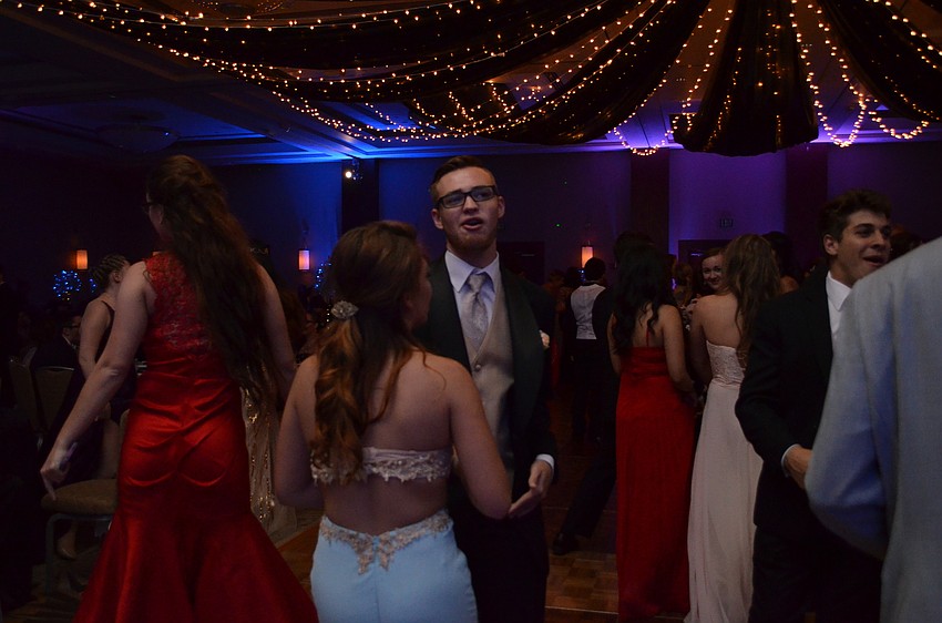Michael Zappardo and Karina Izquierdo make their way to the dance floor.