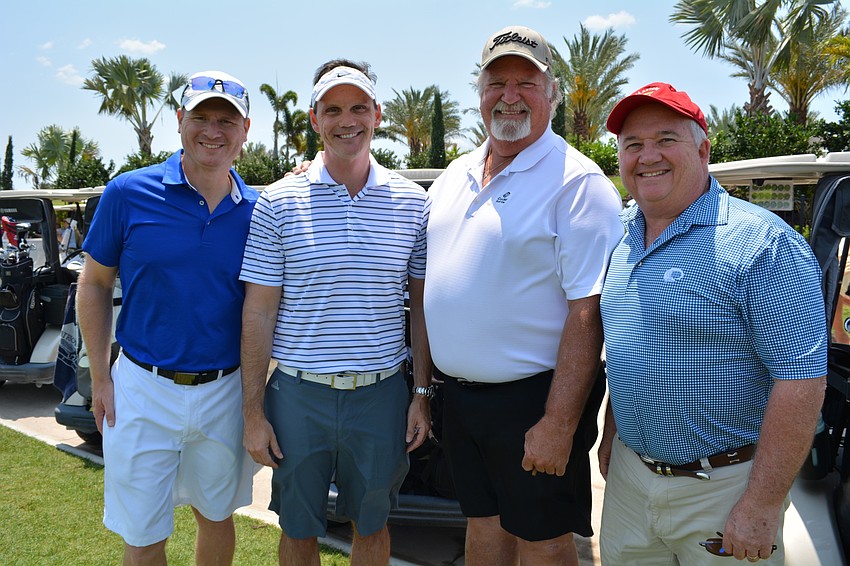Brian Volner, Will Schlotthauer, John Barnott and Rob Lane play on a team sponsored by Arthur Gallagher MGA Insurance.