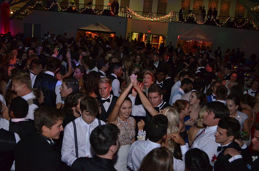 Students fill the dance floor for the Pine View prom at the Sarasota Municipal Auditorium.