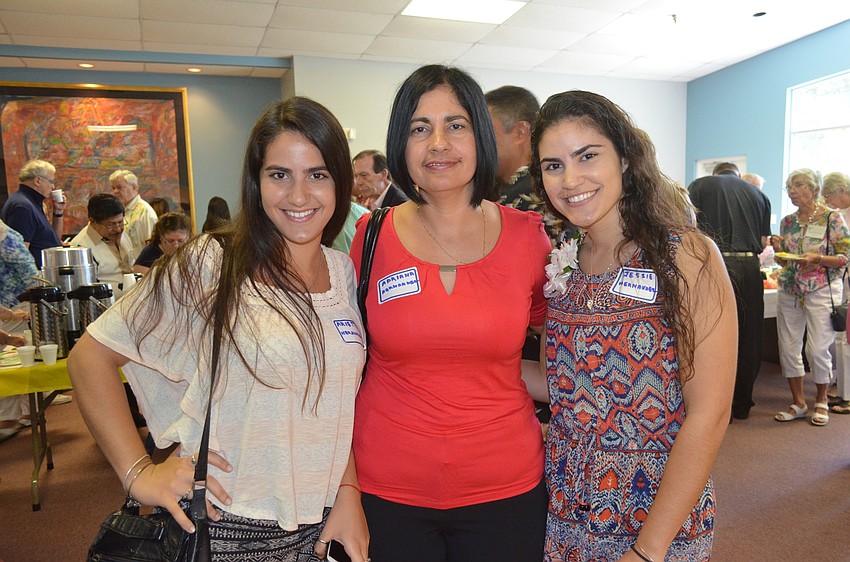 Scholarship recipient Jessie Hernandez, right, with sister, Arlette, and mother, Adriana