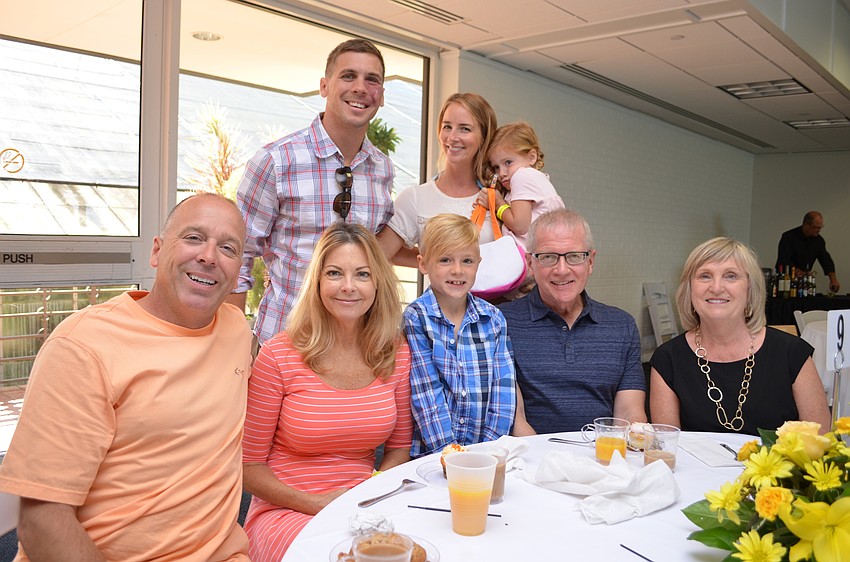 Chris Packer, Lori Shortt, Matt, Liz, Cale and Mila Sandberg with Gordon Noseworthy and Faith Stratton