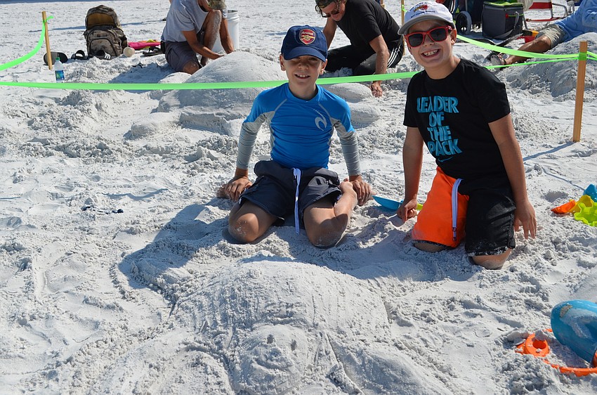 Angus Kirby and Samuel Dorril finish their entry 